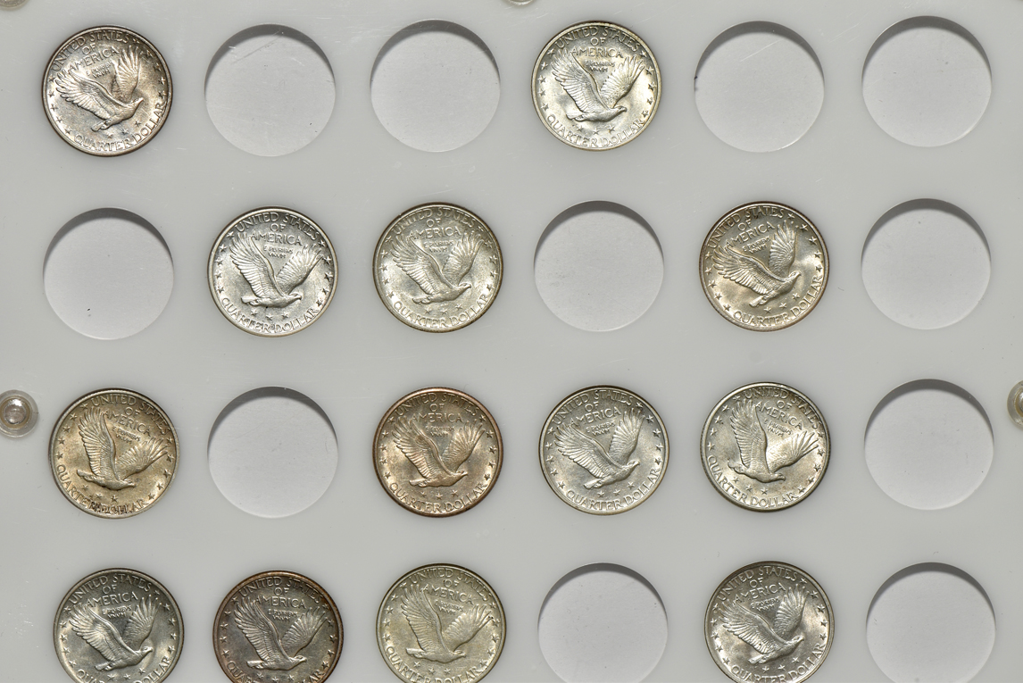 Collection of 20 different Standing Liberty quarters in a Capital Plastics holder