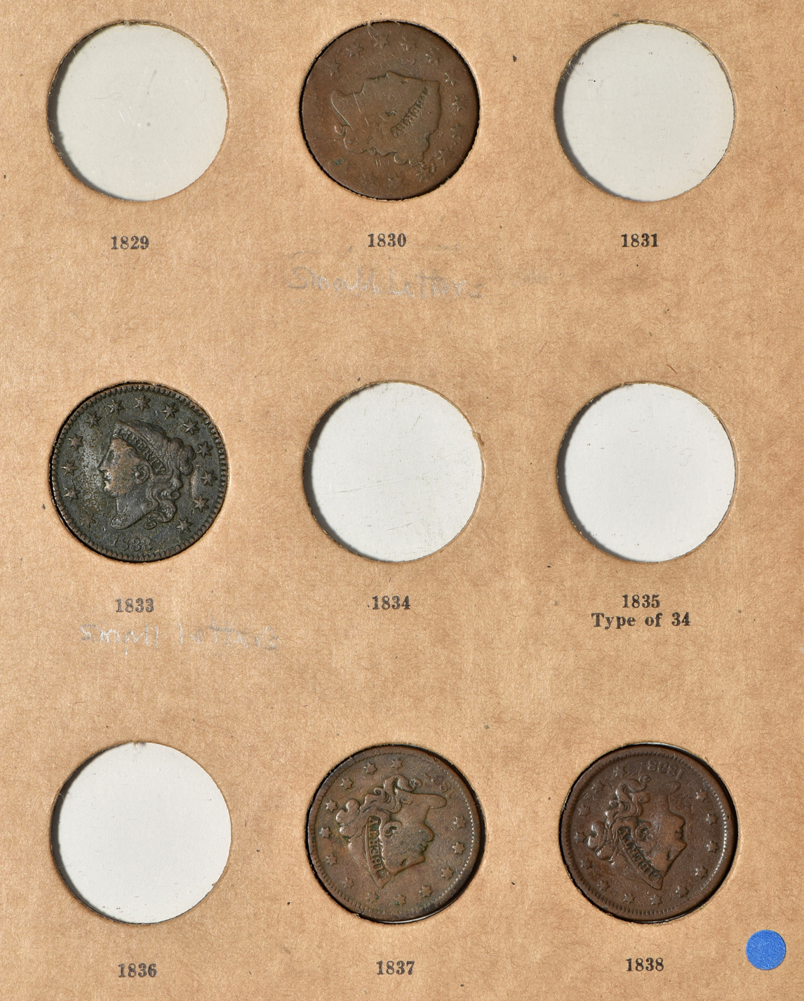 Collection of 28 different large cents and 130 small cents in a Wayte Raymond National Coin album