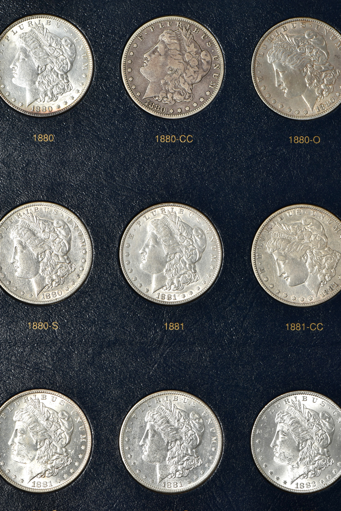 Collection of 54 different Morgan silver dollars, 1878 through 1891-S, in a Whitman classic 9128 album