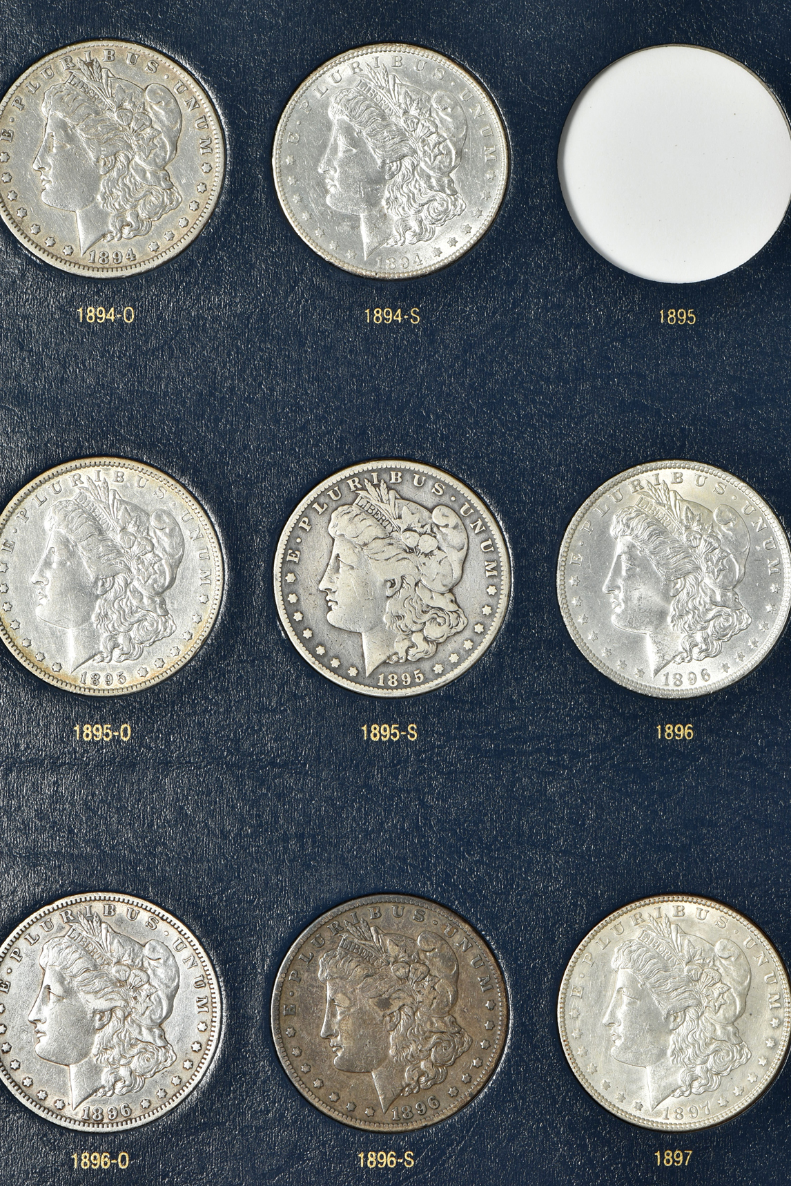 Collection of 43 different Morgan silver dollars, 1892 through 1921-S (no 1895), in a Whitman classic 9129 album