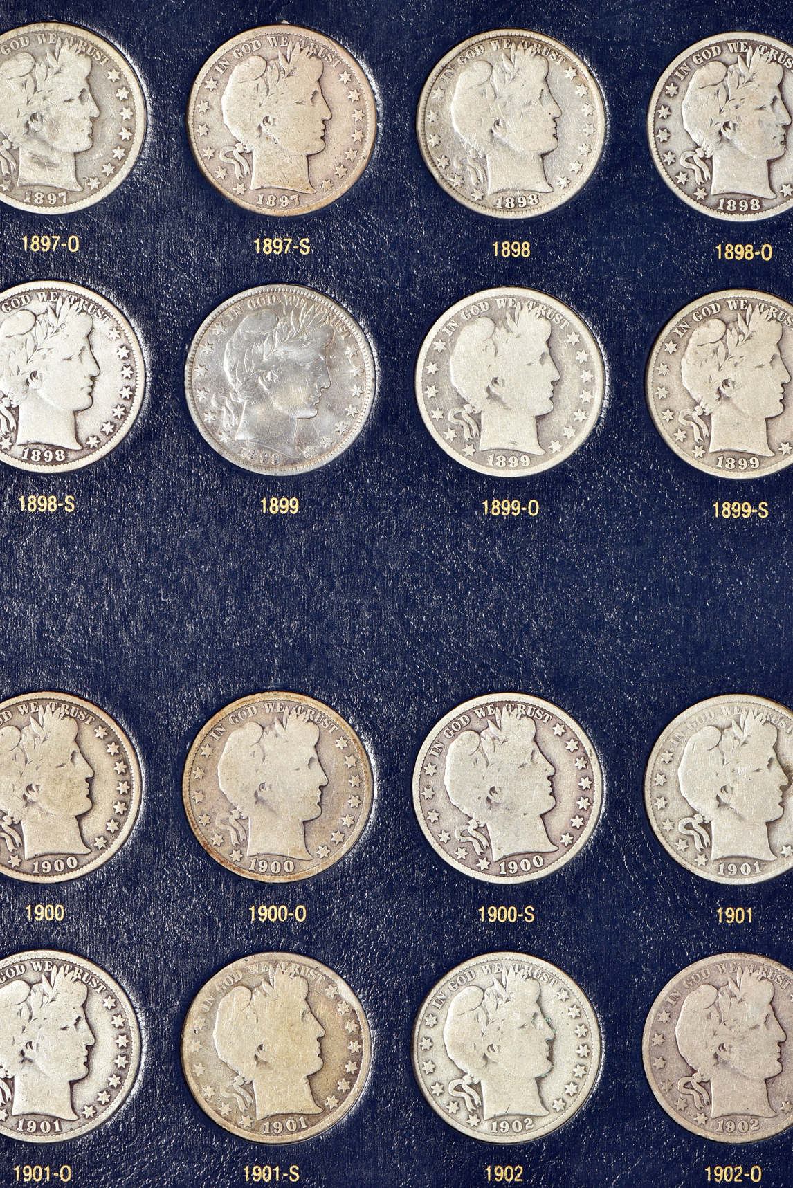 Collection of Barber half-dollars in a Whitman Classic 9124 album
