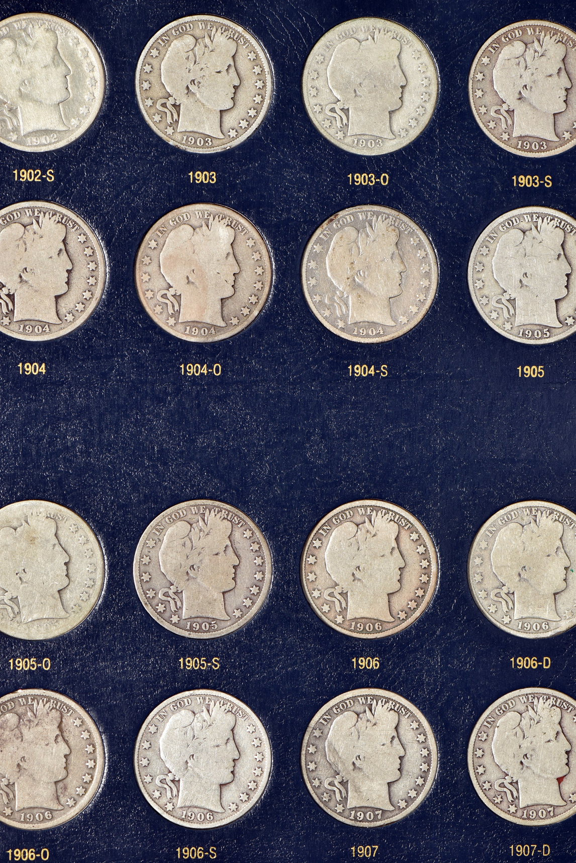 Collection of Barber half-dollars in a Whitman Classic 9124 album