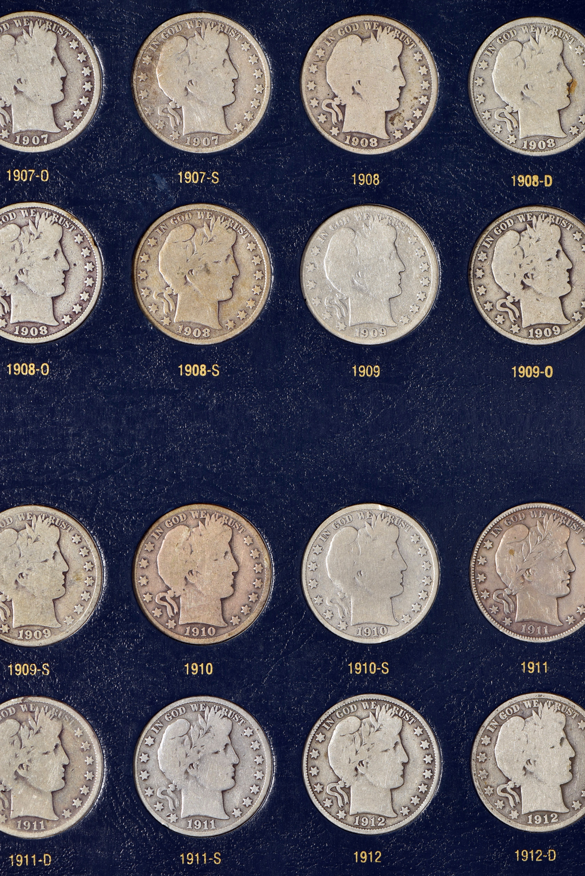 Collection of Barber half-dollars in a Whitman Classic 9124 album