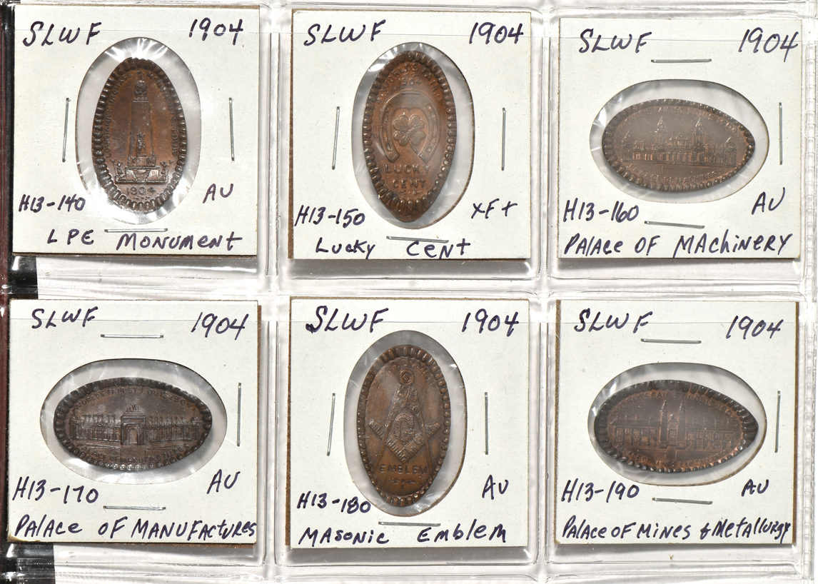 Forty 1904 World's Fair pieces in a Dansco album