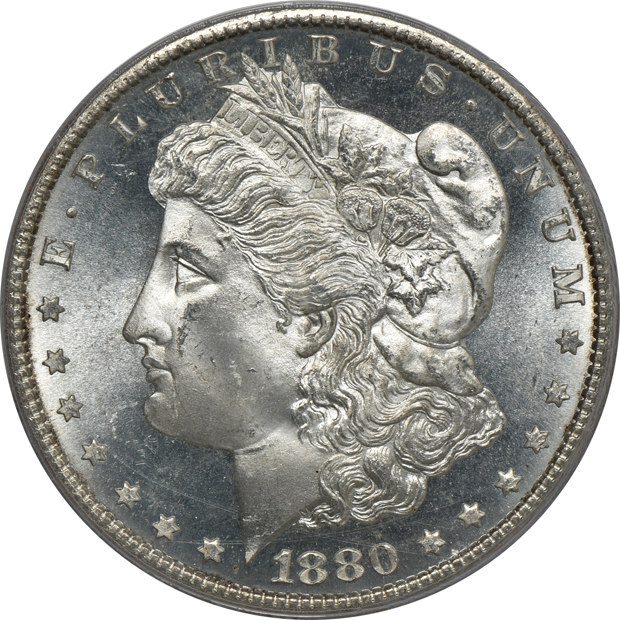 1880-S PCGS MS-66, 1885 PCGS MS-65 (rattler), and a 1903 NGC MS-65, all CAC