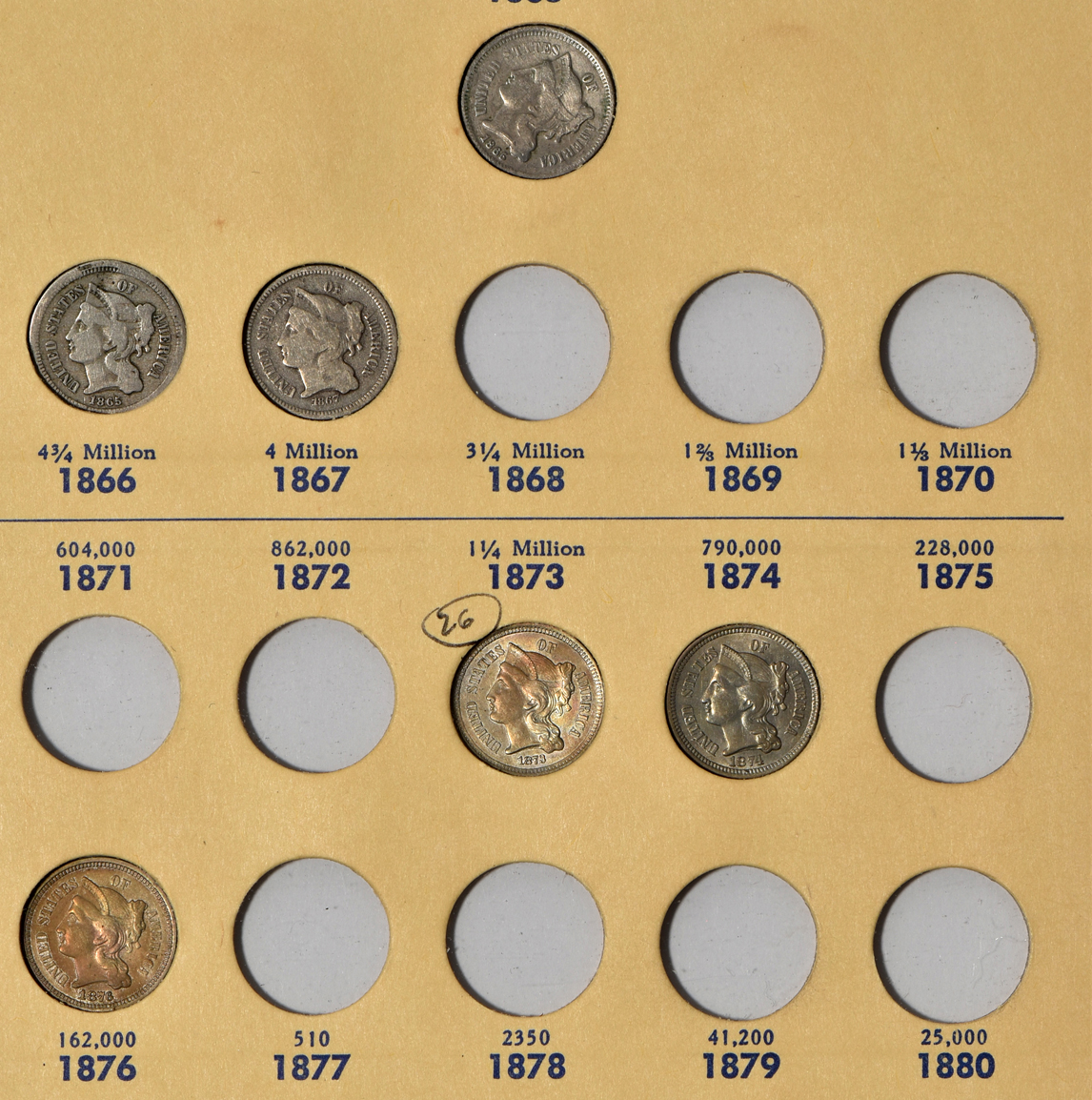 Six two-cent pieces, a twenty-cent piece, five three-cent nickels, three three-cent silvers, and eight Shield nickels in a Library of Coins Vol. 35 album