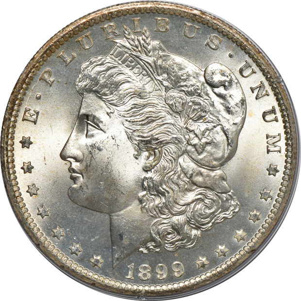 1885 MS-65, 1899-O MS-65, and a 1902 MS-63, all PCGS (rattler) CAC