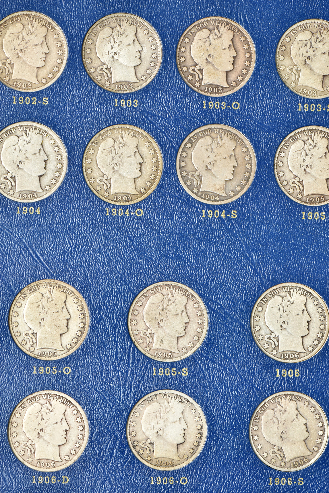 Complete collection of Barber half-dollars in two Whitman albums