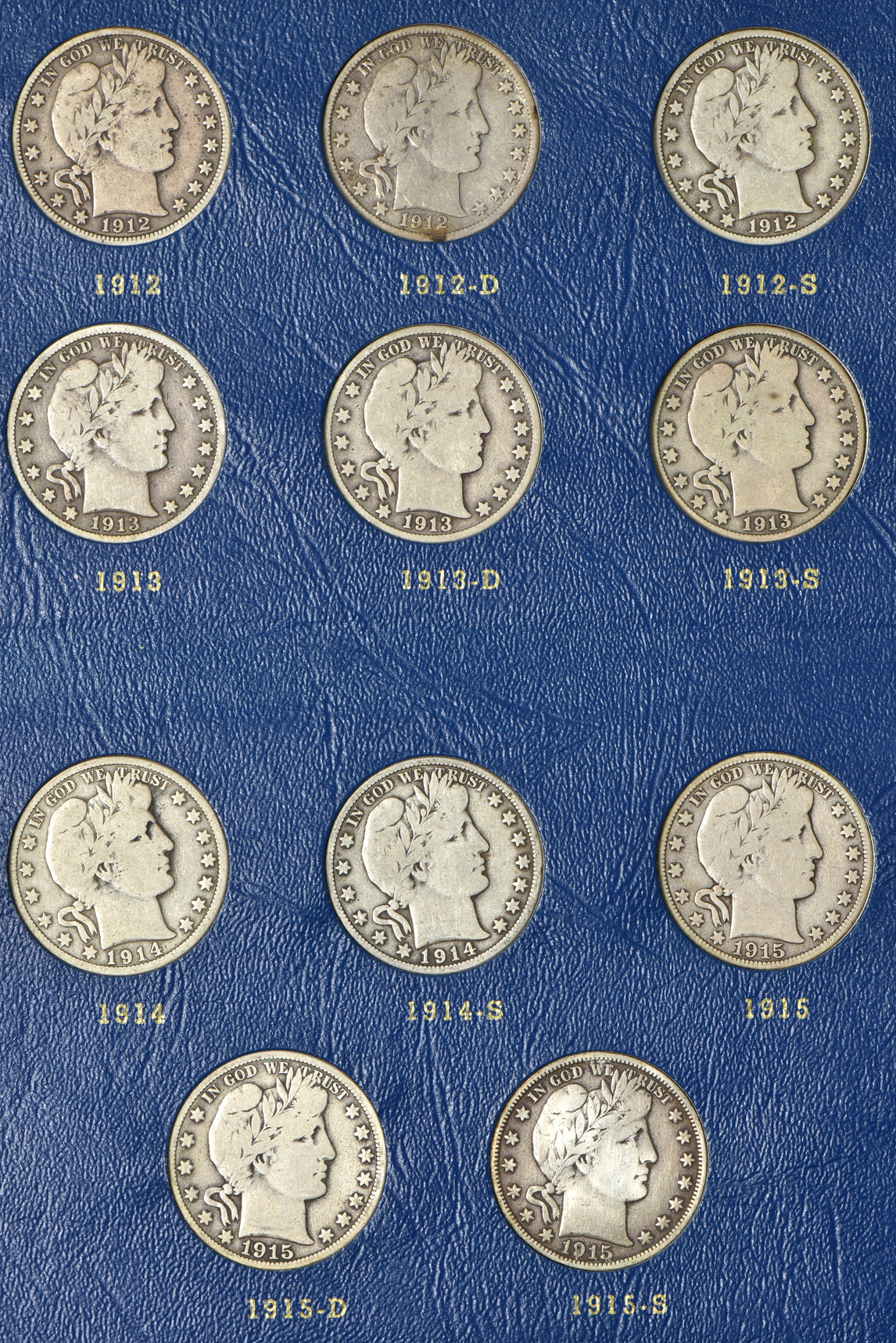 Complete collection of Barber half-dollars in two Whitman albums
