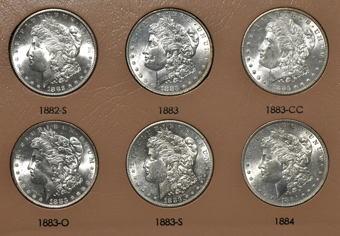 Collection of 46 different Morgan silver dollars in a Dansco 7178 album