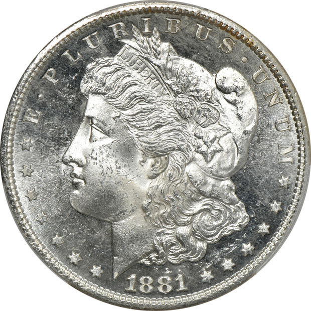Four Morgan silver dollars certified by PCGS