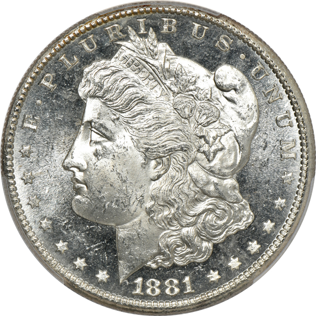 Four Morgan silver dollars certified by PCGS