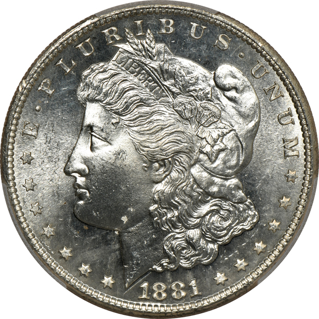 Four Morgan silver dollars certified MS-65 by PCGS
