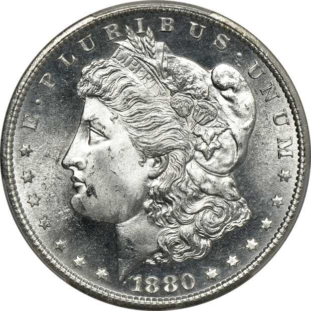 Four Morgan silver dollars certified MS-65 by PCGS