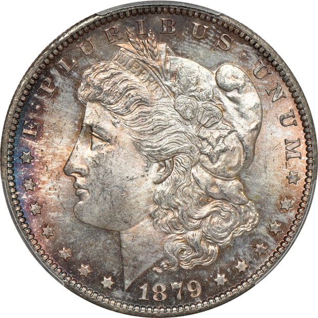 1879-S MS-65, 1879-S MS-65 CAC, and an 1885 MS-65, all PCGS