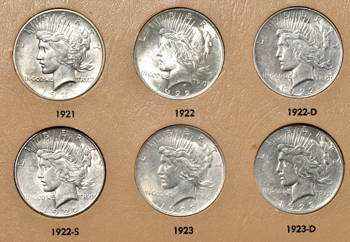 Collection of Peace silver dollars in a complete Dansco 7175 album