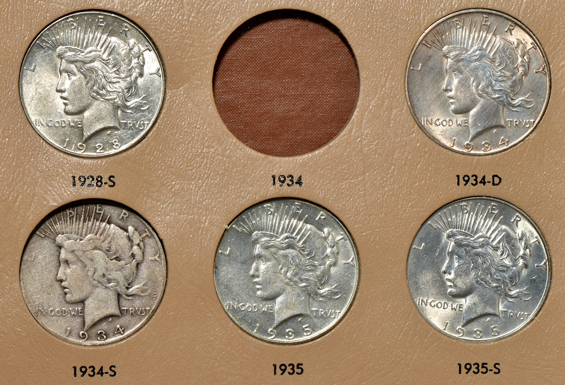 Collection of Peace silver dollars in a complete Dansco 7175 album