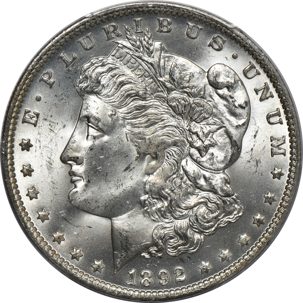 1882-O MS-65, 1888-O MS-65, and an 1892-O MS-64, all PCGS