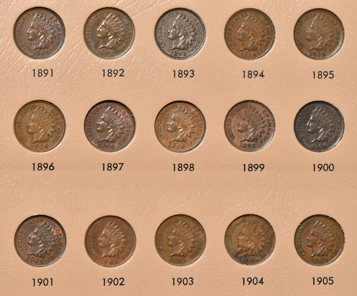Collections of Flying Eagle and Indian Head cents in a Dansco 7101 album