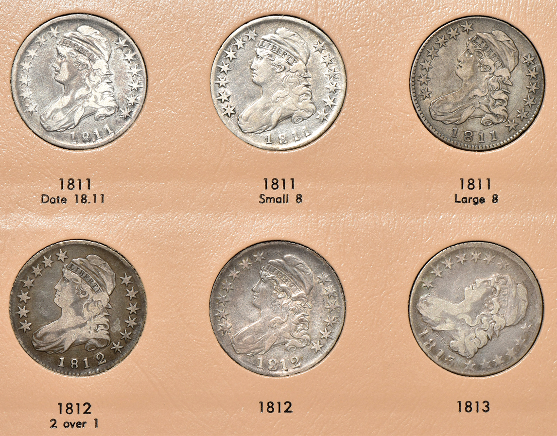 Collection of early half-dollars in a Dansco Volume 1 and Volume 2 6151 album