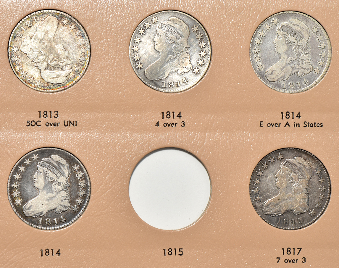 Collection of early half-dollars in a Dansco Volume 1 and Volume 2 6151 album