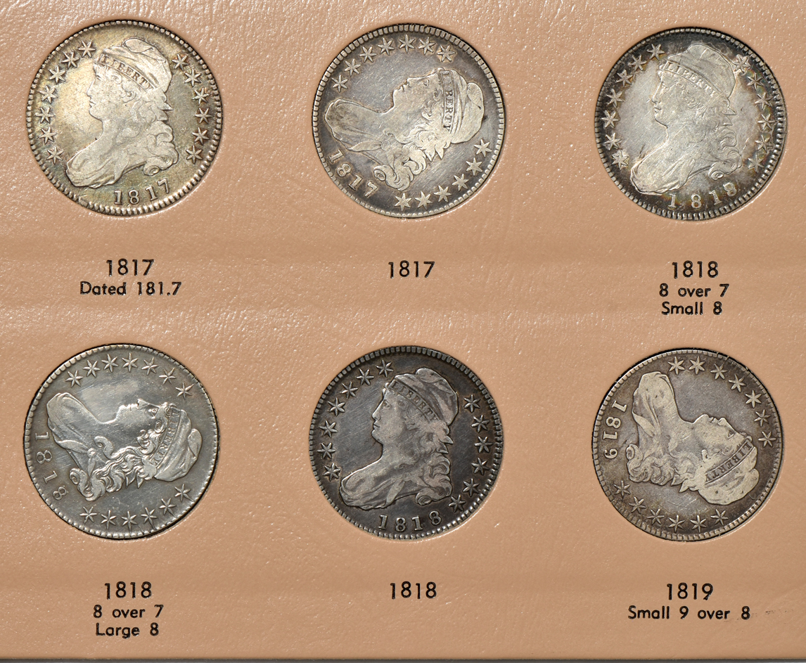 Collection of early half-dollars in a Dansco Volume 1 and Volume 2 6151 album