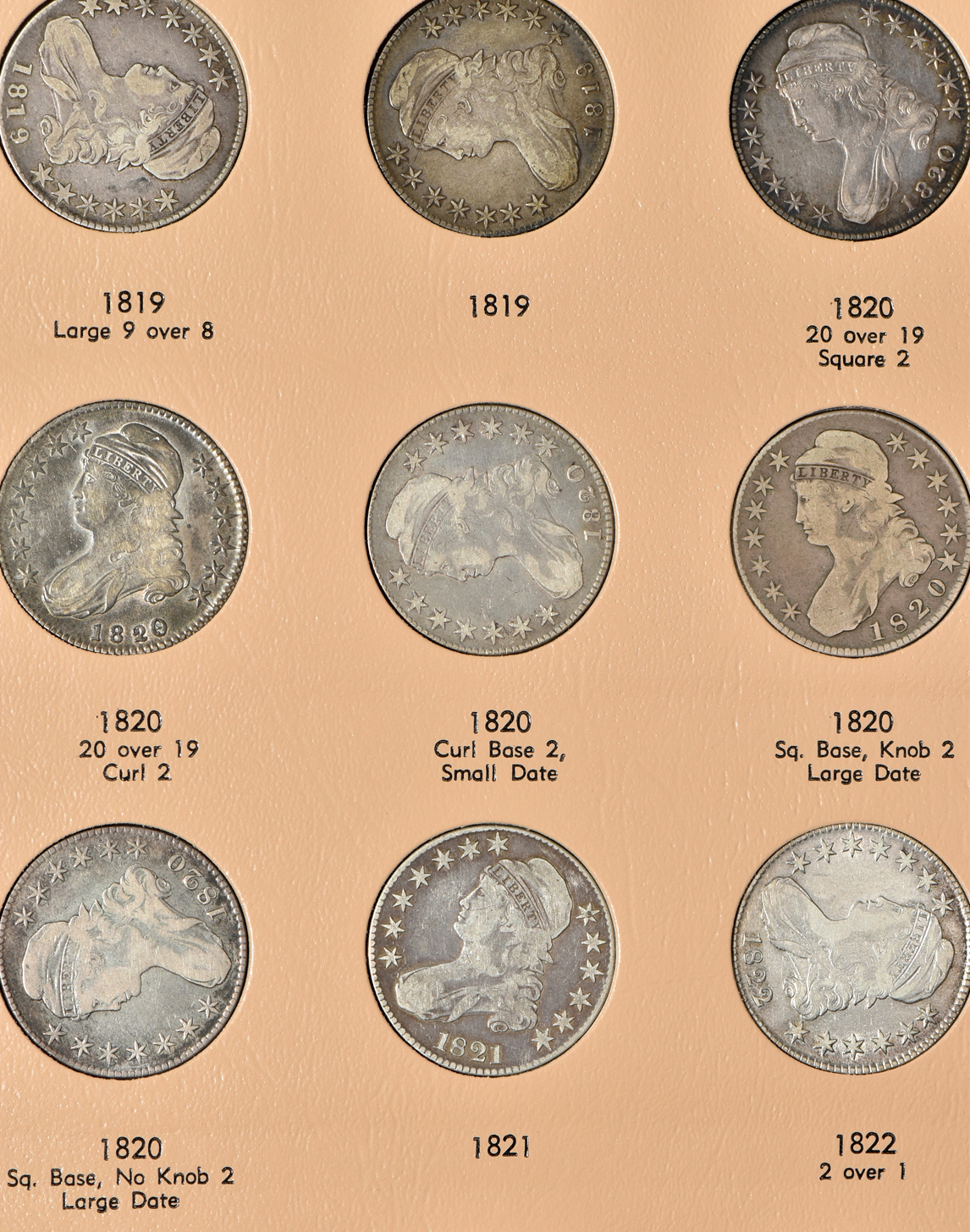 Collection of early half-dollars in a Dansco Volume 1 and Volume 2 6151 album