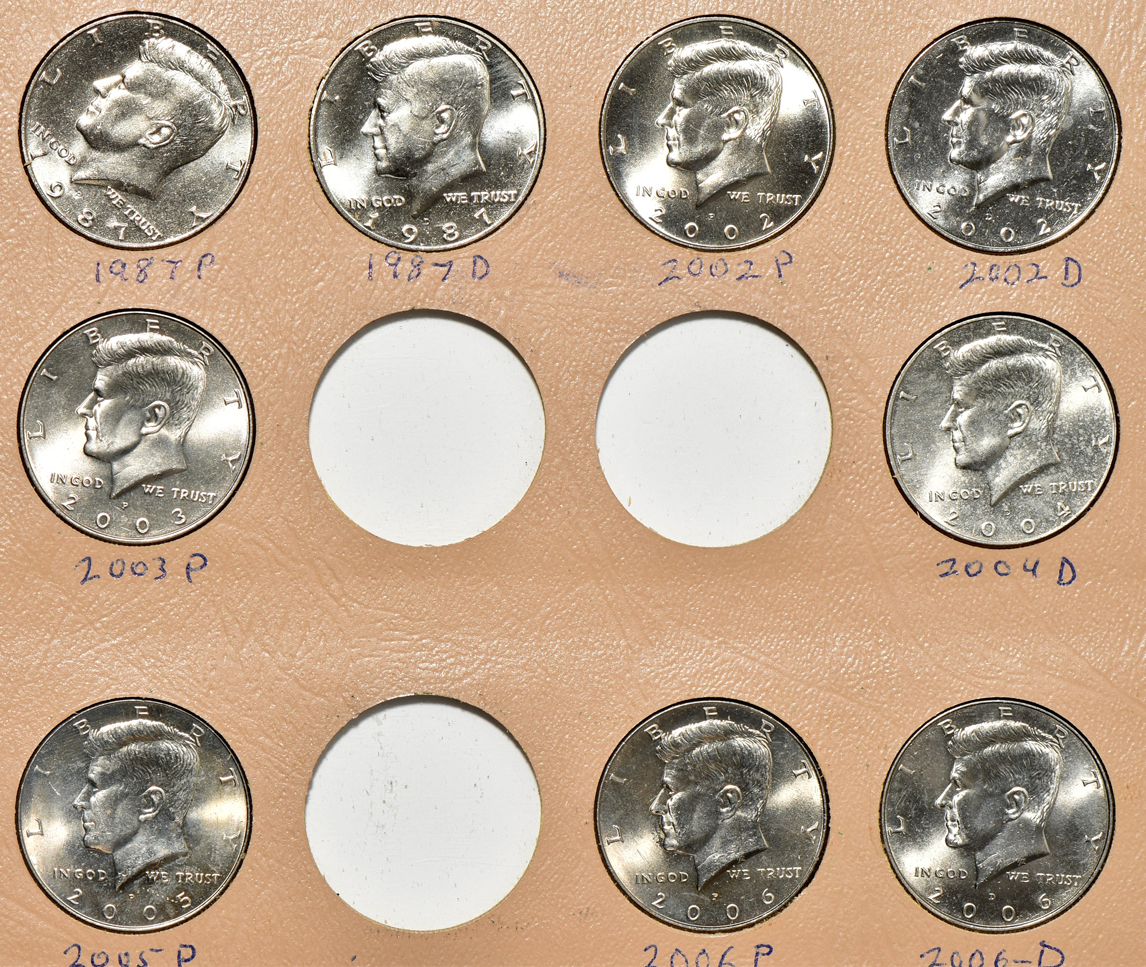 Collection of 94 Kennedy half-dollars, including varieties, in a Dansco album