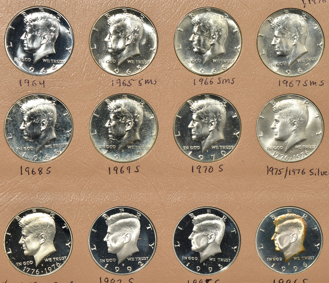 Collection of 94 Kennedy half-dollars, including varieties, in a Dansco album