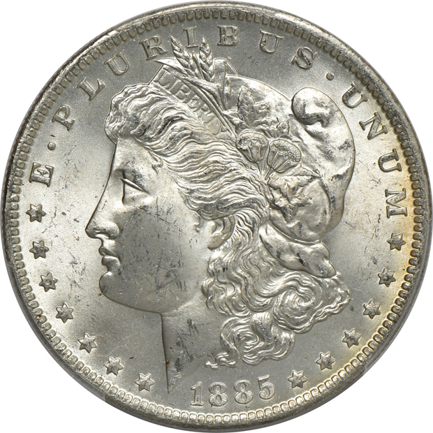 Four Uncirculated Morgan silver dollars certified by PCGS
