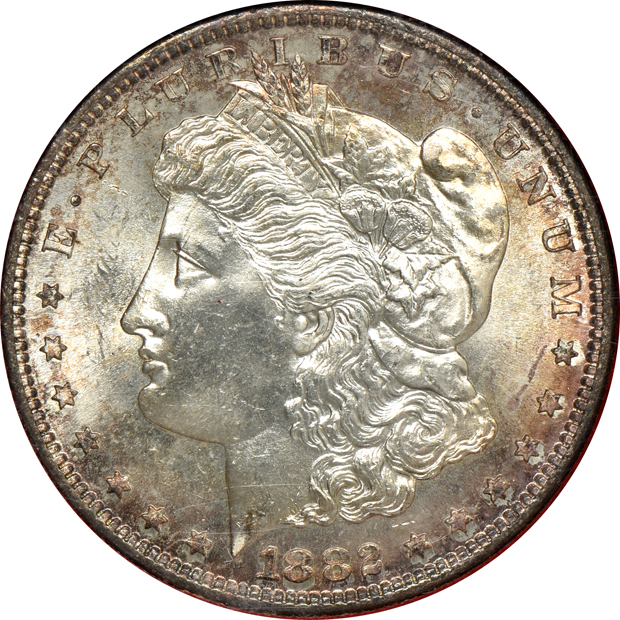 Five Morgan silver dollars, all from The Redfield Collection