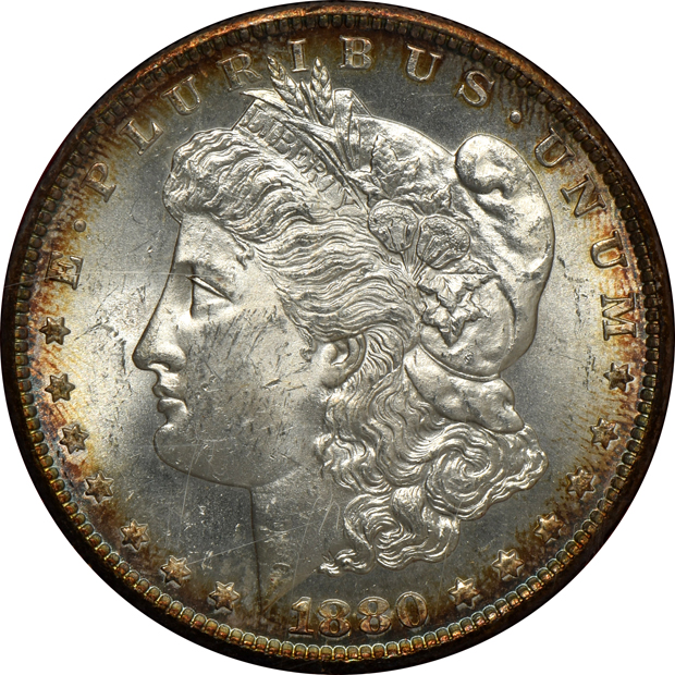 Five Morgan silver dollars, all from The Redfield Collection