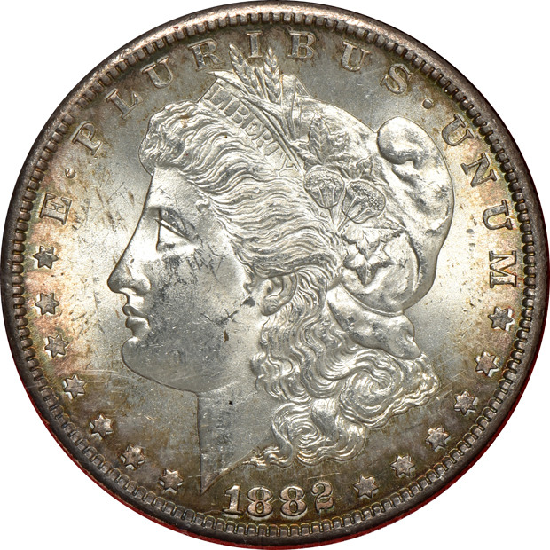Five Morgan silver dollars, all from The Redfield Collection