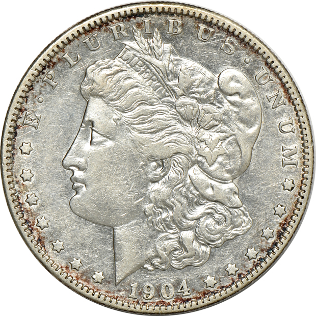 Four Morgan silver dollars