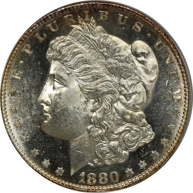Four Morgan silver dollars certified by ANACS
