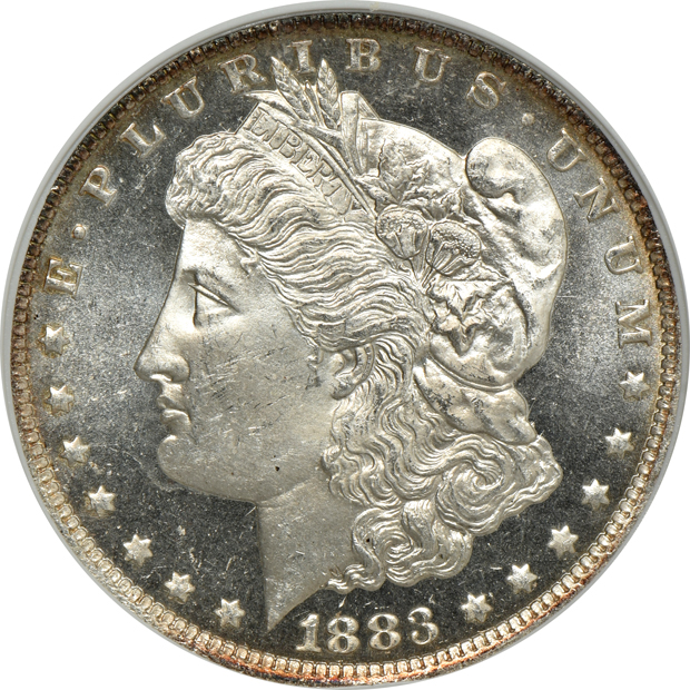Four Morgan silver dollars certified by ANACS