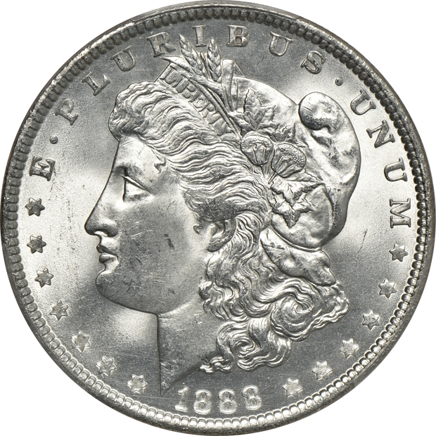 1883 MS-65, 1888 MS-65, and a 1903 MS-64, all PCGS