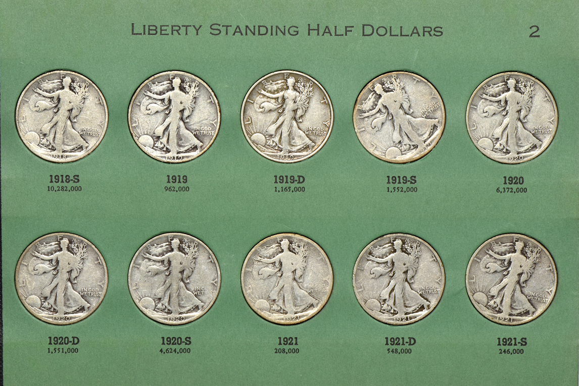 Complete collection of Walking Liberty half dollars in two albums
