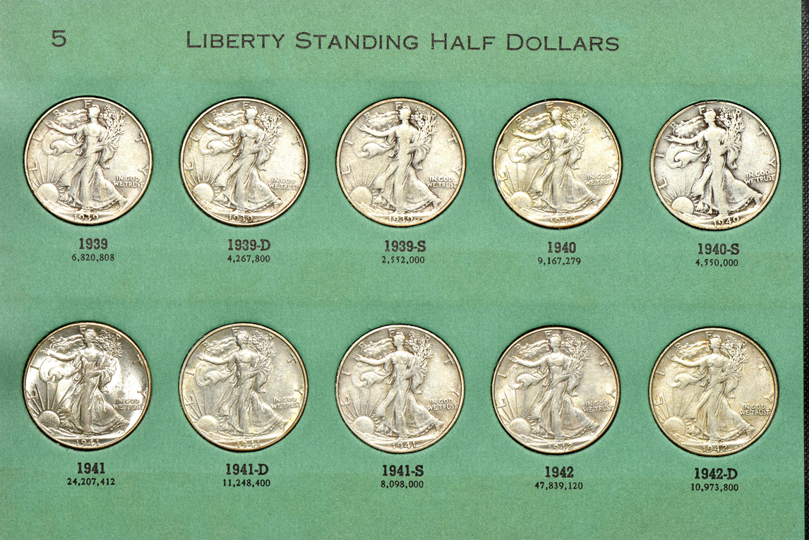 Complete collection of Walking Liberty half dollars in two albums