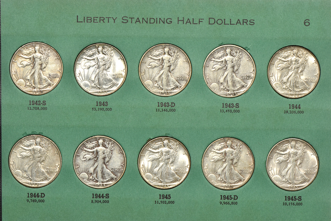 Complete collection of Walking Liberty half dollars in two albums