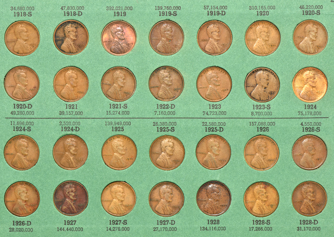 Collections of Lincoln cents, Buffalo nickels, Jefferson nickels, and Franklin half dollars in five albums