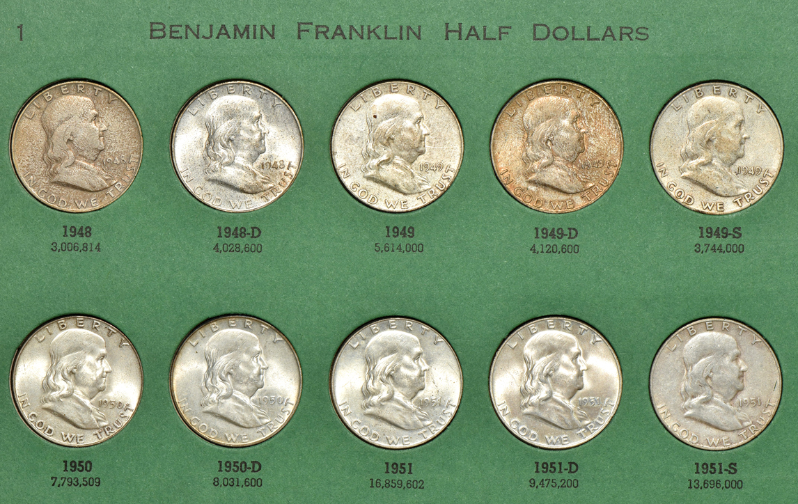 Collections of Lincoln cents, Buffalo nickels, Jefferson nickels, and Franklin half dollars in five albums