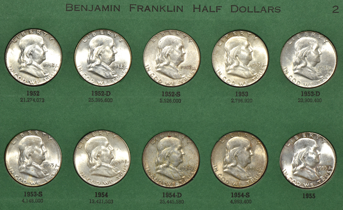 Collections of Lincoln cents, Buffalo nickels, Jefferson nickels, and Franklin half dollars in five albums
