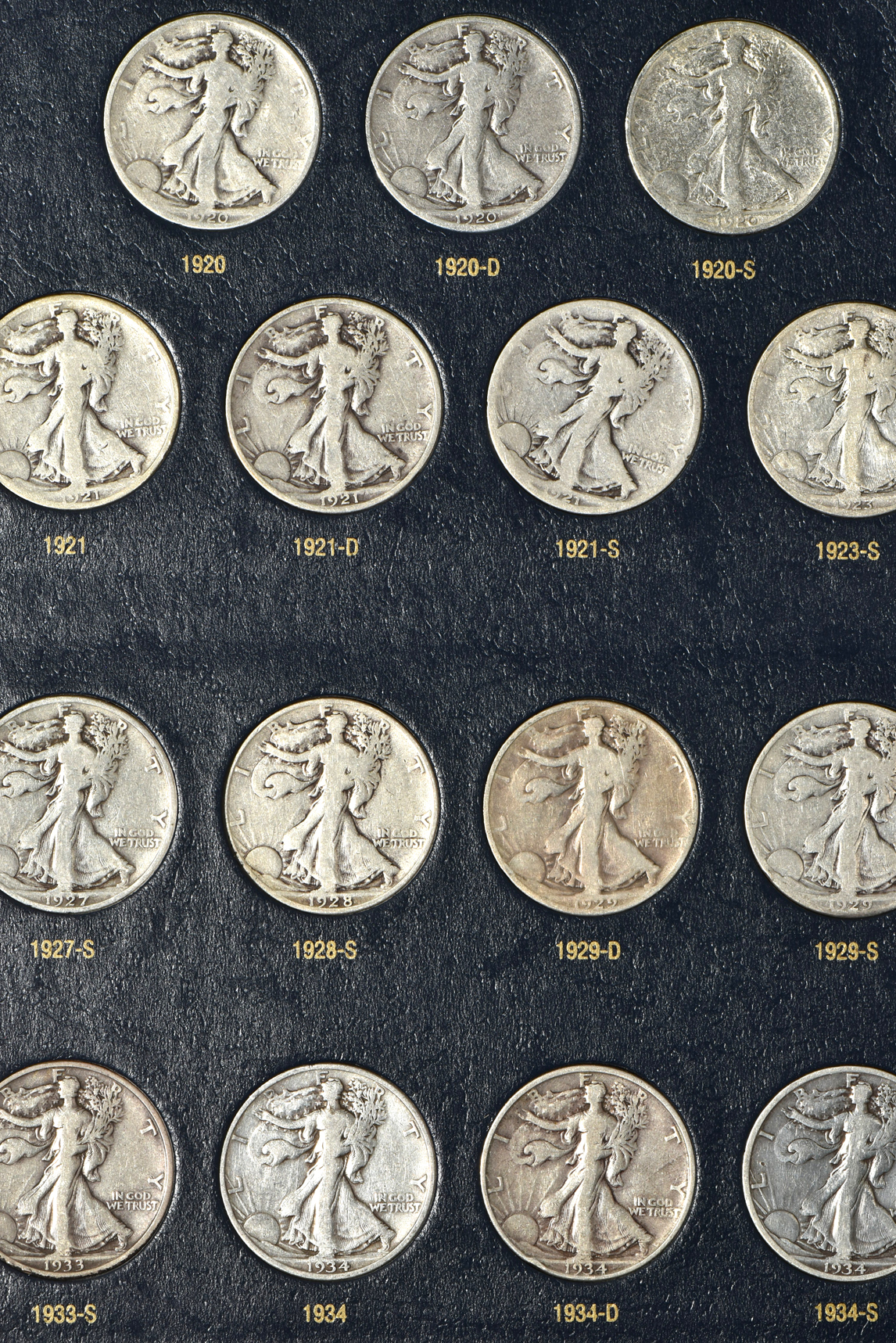 Complete collection of Walking Liberty half-dollars in a Whitman 9125 album