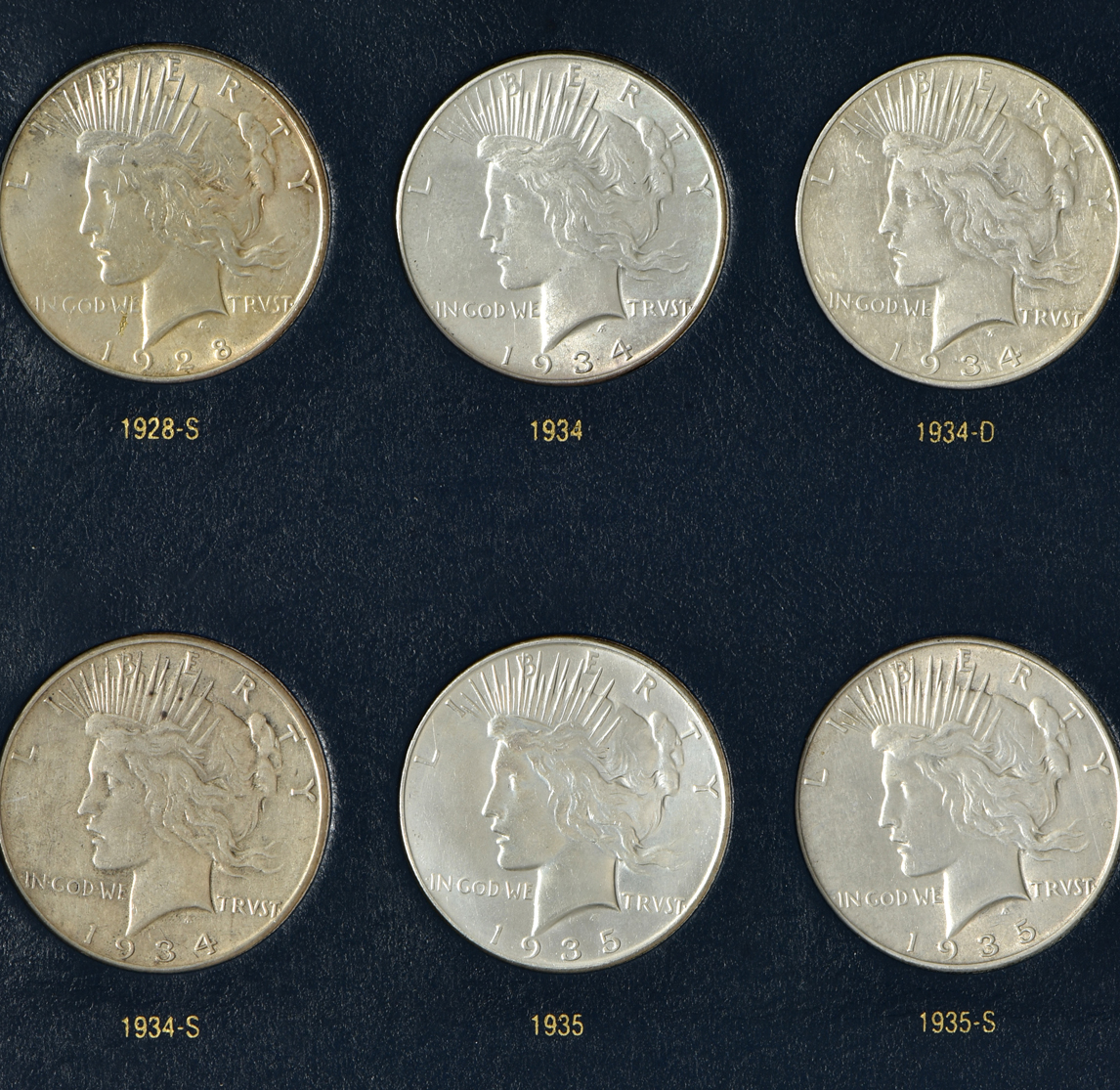 Complete collection of Peace silver dollars in a Whitman 9130 album