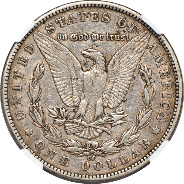 Four circulated Morgan silver dollars certified by NGC