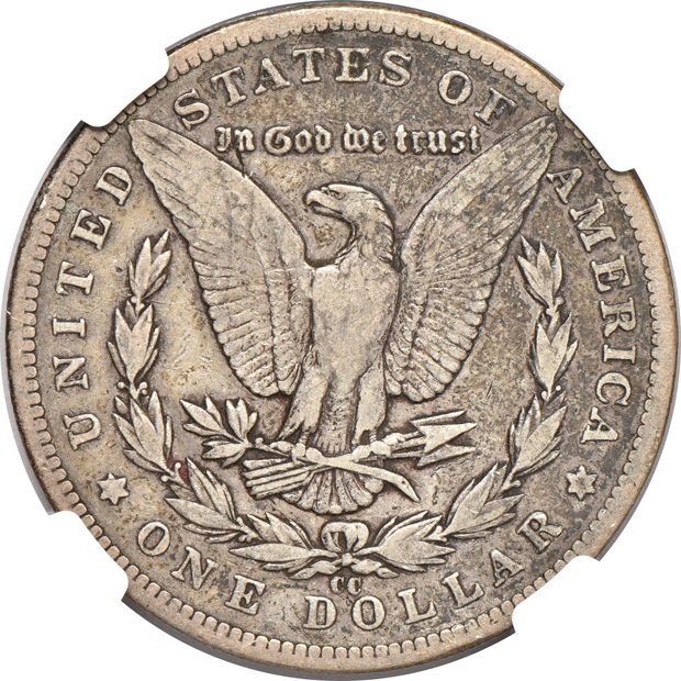 Four circulated Morgan silver dollars certified by NGC