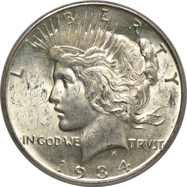Seven Uncirculated Peace silver dollars certified by PCGS 