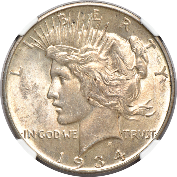 Seven Uncirculated Peace silver dollars certified by NGC