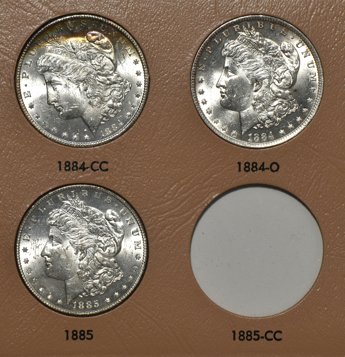 Collection of 40 different Morgan silver dollars in a Dansco 7178 album